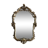 Rocaille style mirror from the 20th century in wood and gilded stucco, Putto on the pediment