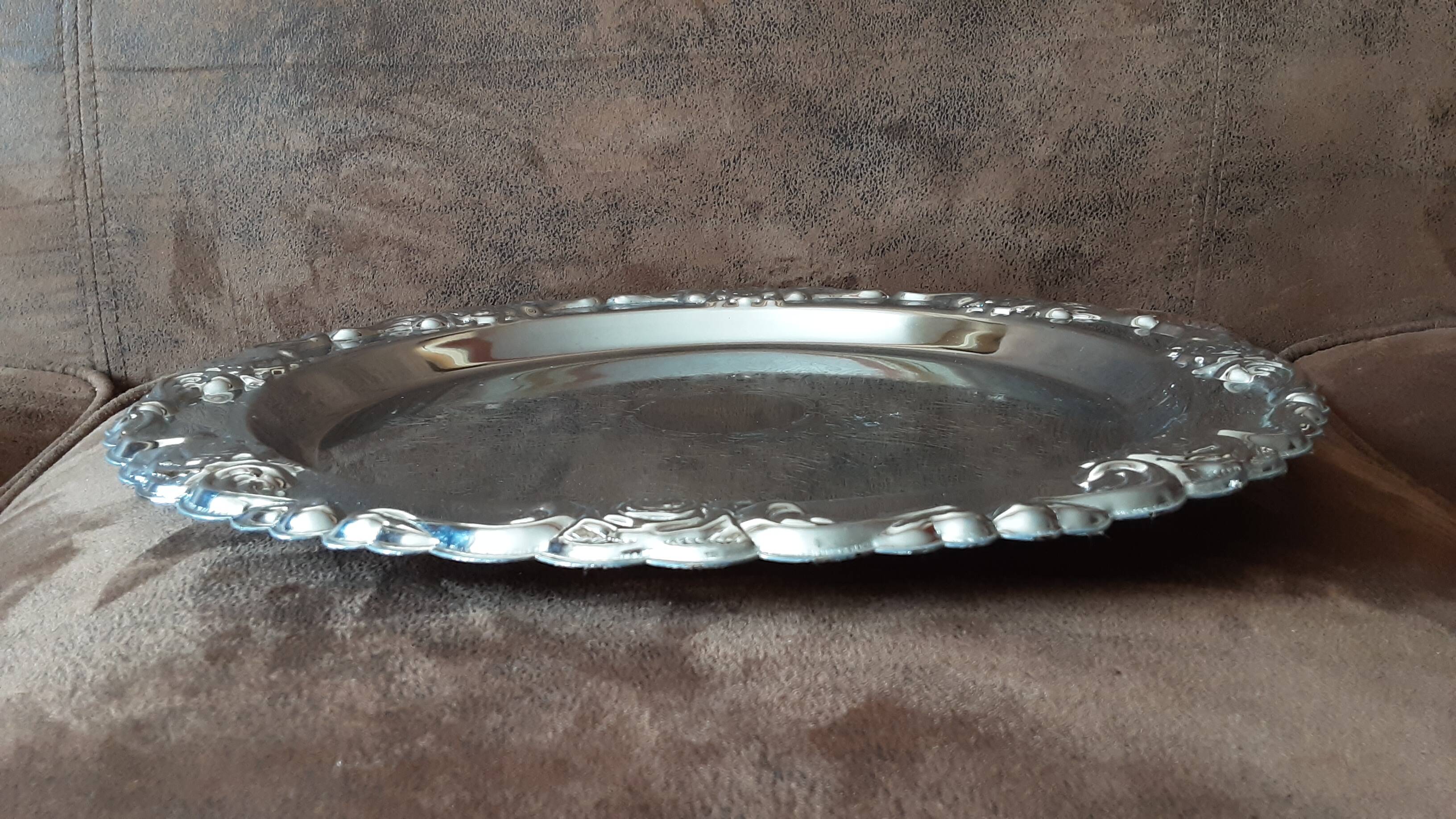 Silver-coloured metal plate