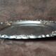 Silver-coloured metal plate