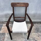 Scandinavian chair in wood and woven natural fibre.