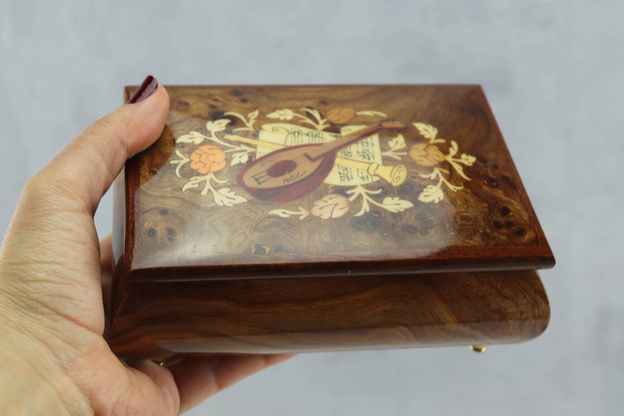 Vintage musical jewelry box in inlaid wood