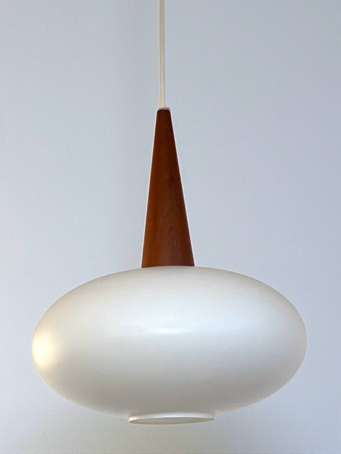 Vintage suspension light in opaline by Louis Kalff for Philips from 1968.