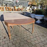12-foot round oak table with 7 extensions / 20 people
