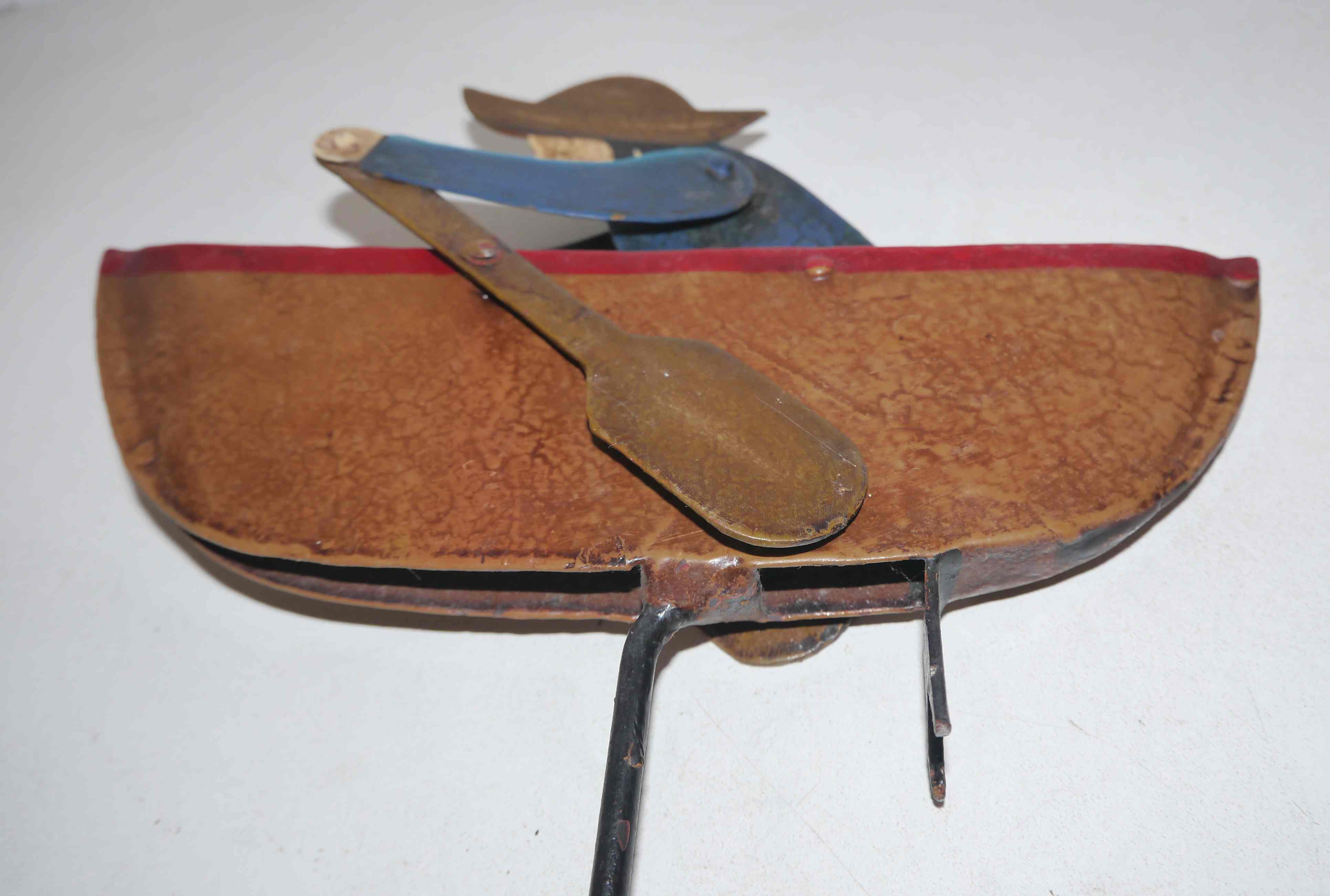 Old fishing counter balance toy in a boat
