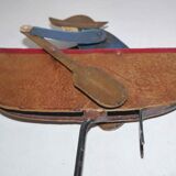 Old fishing counter balance toy in a boat