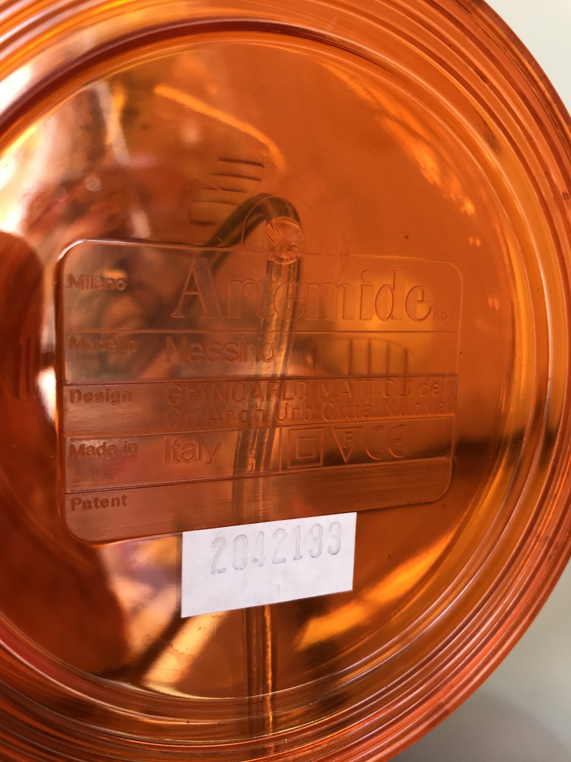 Orange nessino pose lamp for artemide by giancarlo mattioli