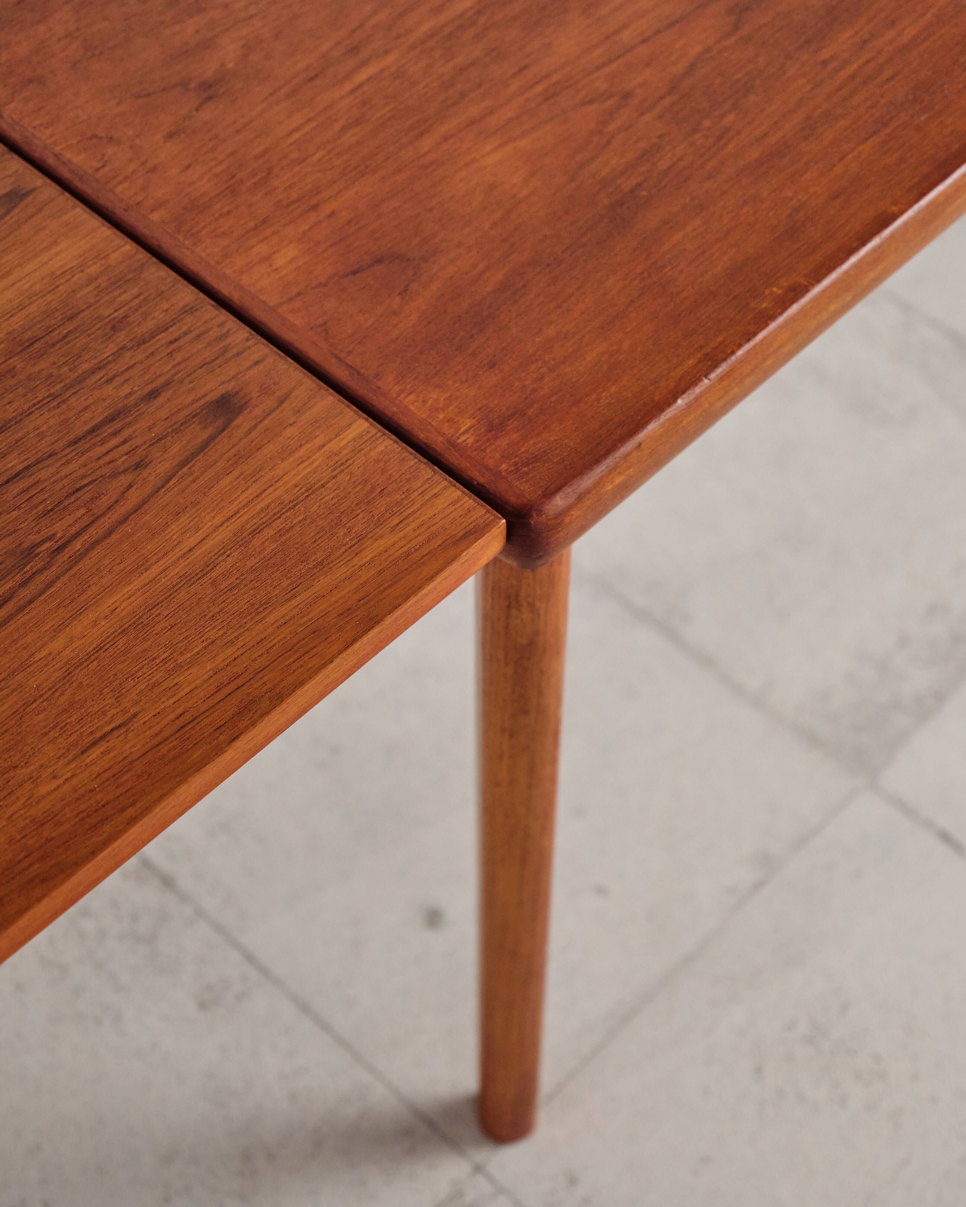 Extendable table by Henning Kjærnulf for Vejle Stole, 1960s.