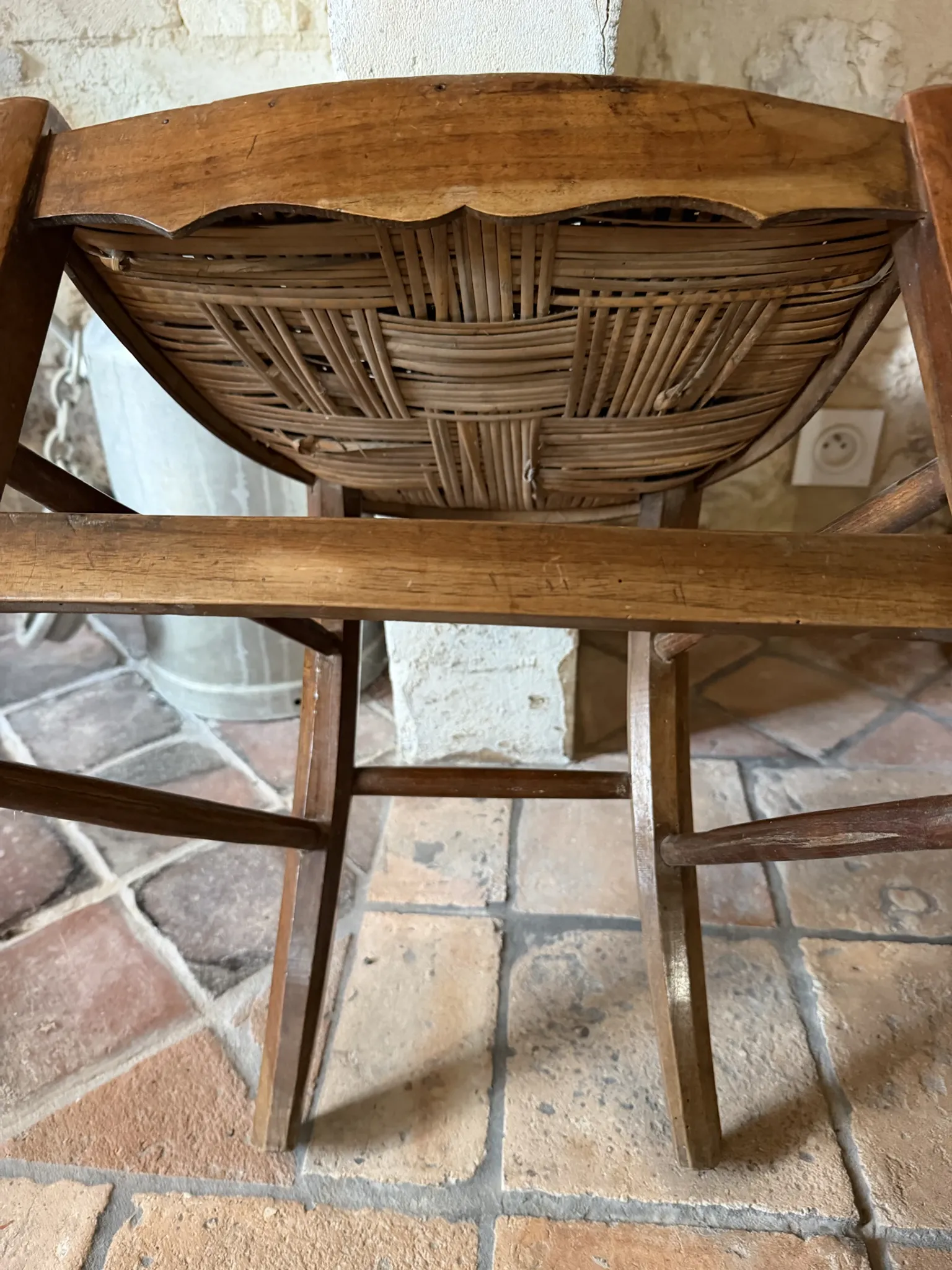 Campaign stool in rattan and wood
