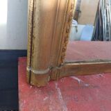 19th century mirror in wood and gilded stucco "scallop shell"