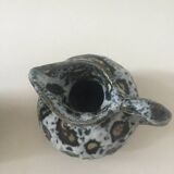 Set of two small Vallauris yellow and black milk jugs