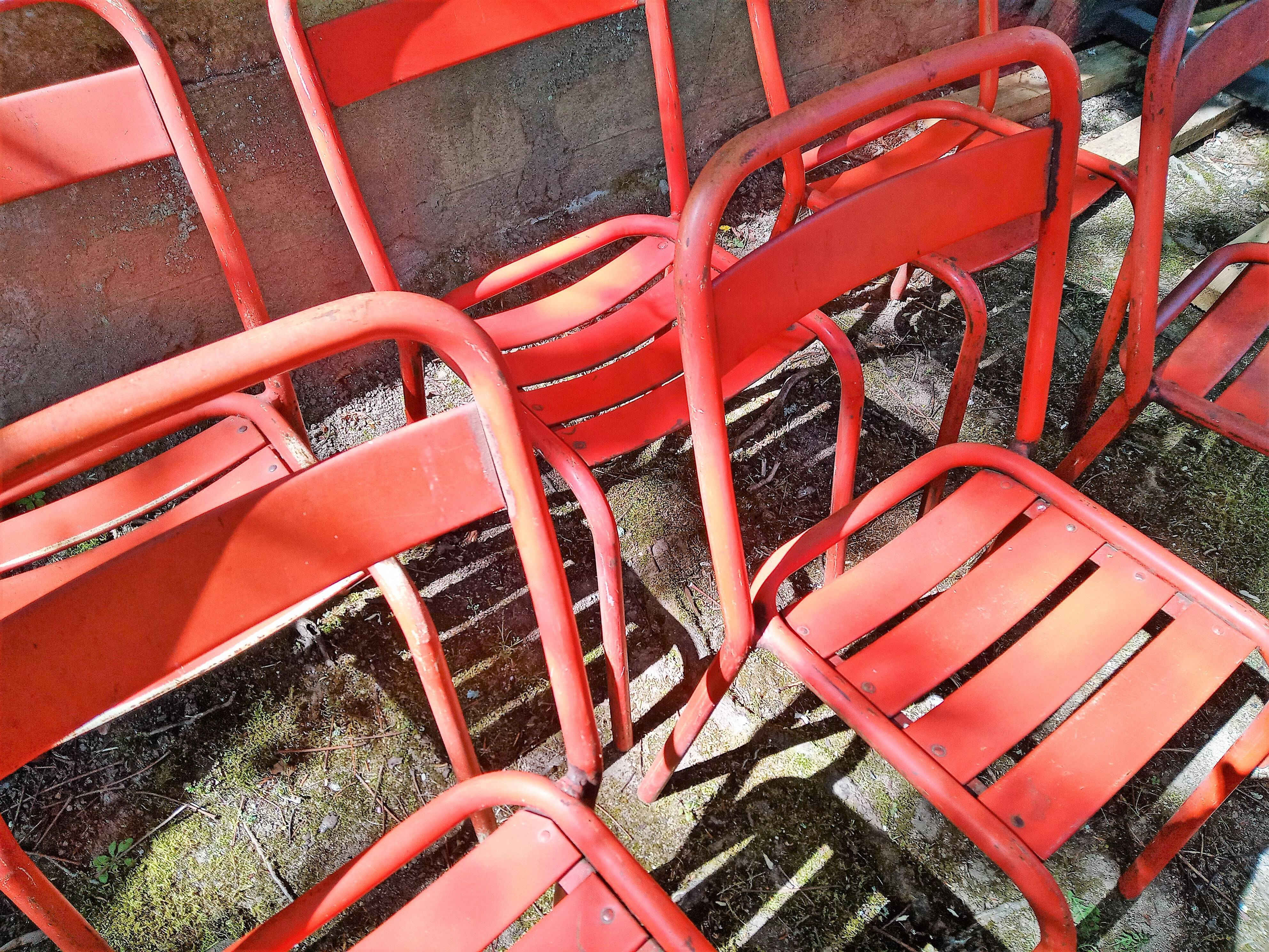 Series of 8 red Tolix chairs