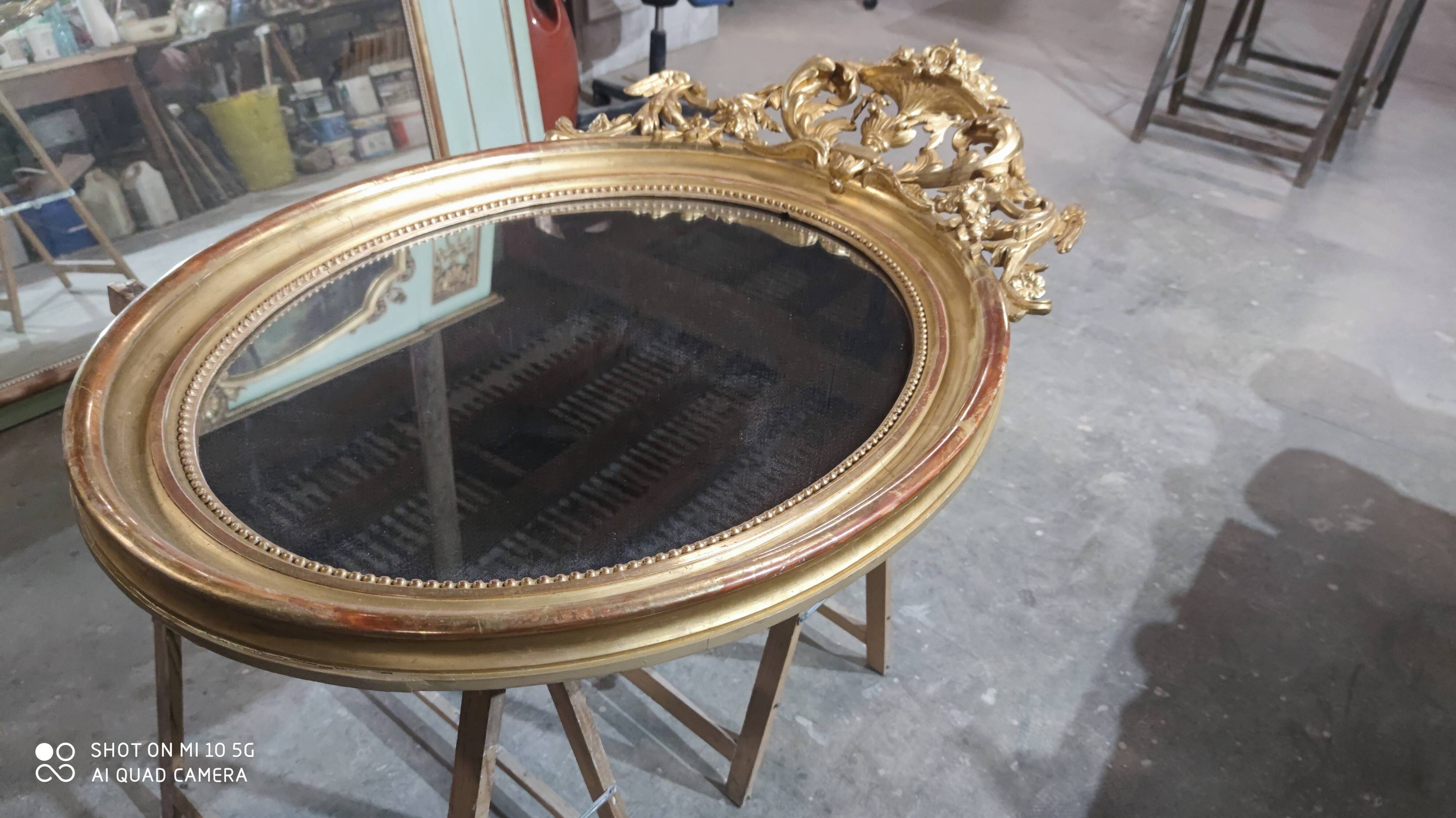 Mirror with a gilt medallion pediment, 1840
