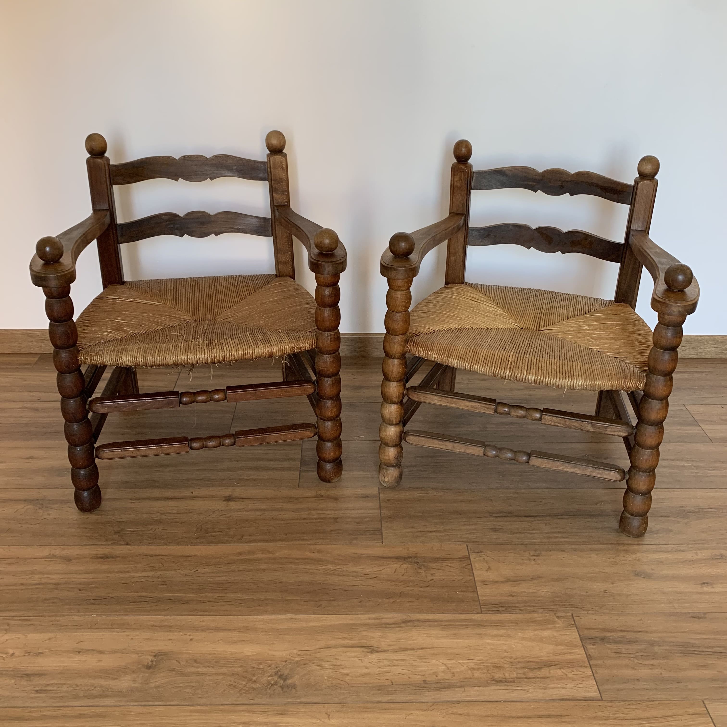 2 mulched armchairs in turned wood