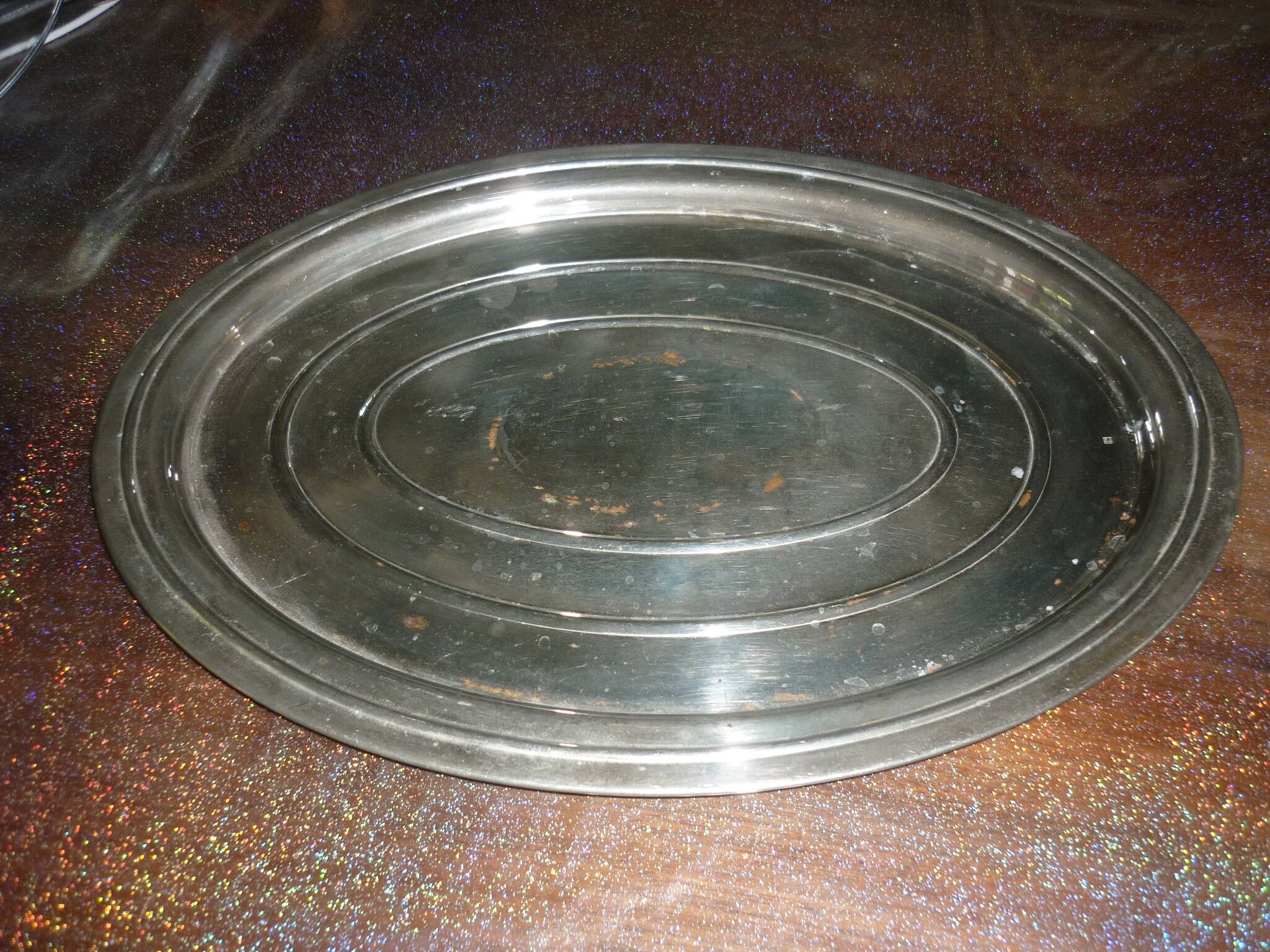 Silver metal oval top