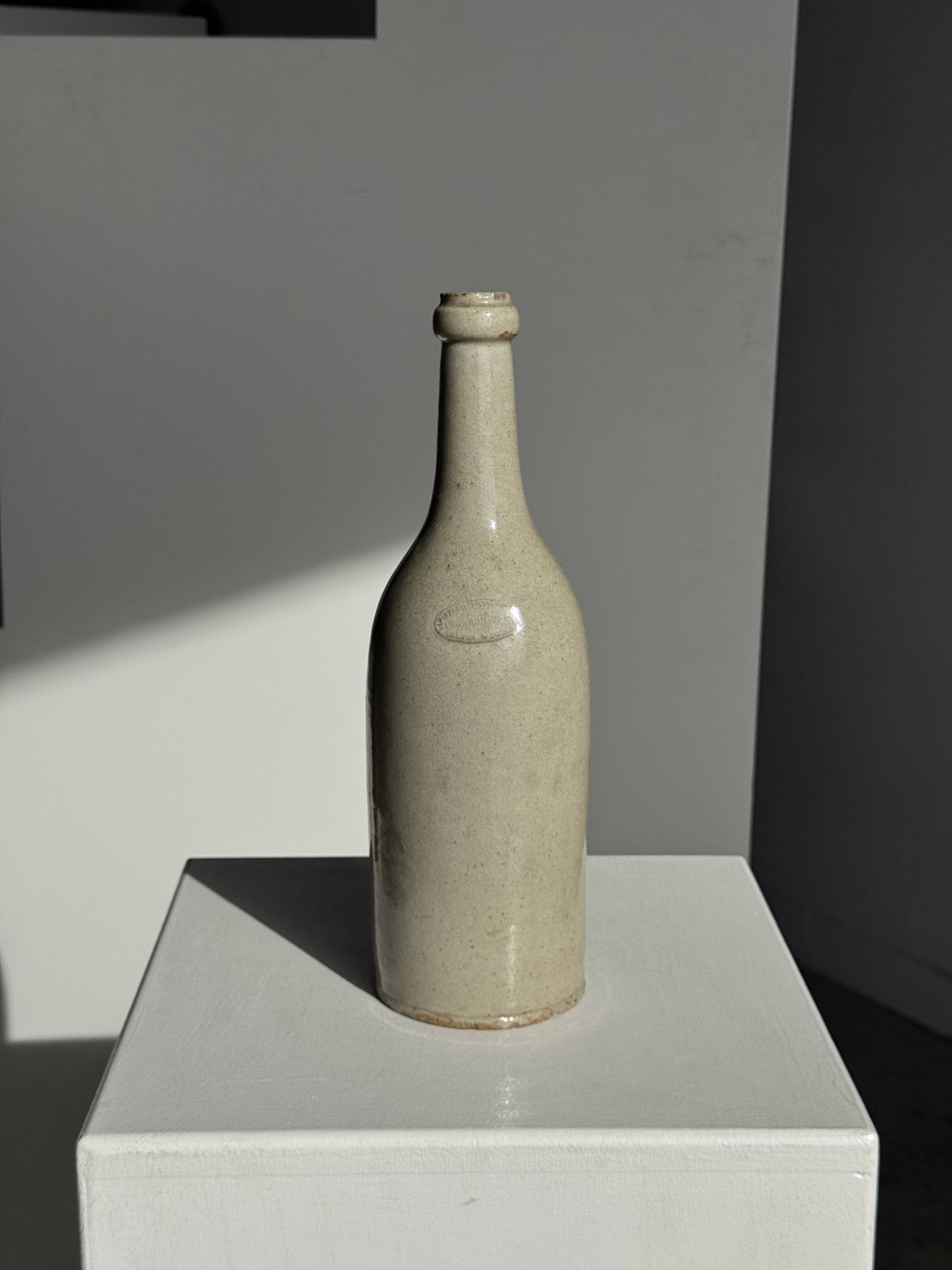 Bouteille vintage en grès beige moucheté H31