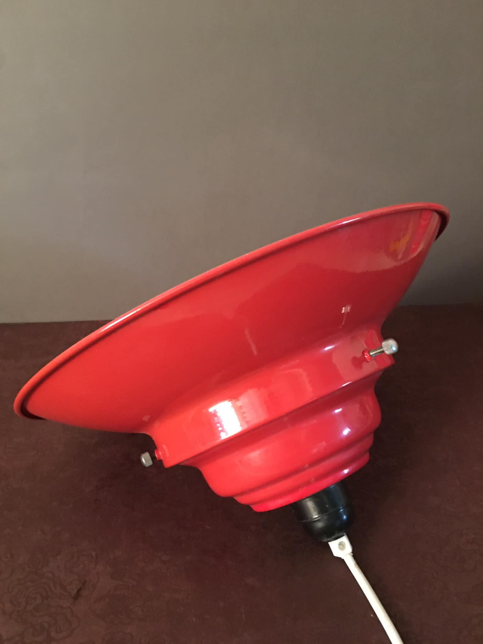 Industrial suspension in red metal