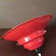 Industrial suspension in red metal