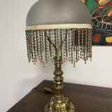 Bronze, opaline and tassel table lamp