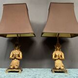 Paire de lampes de table à figurines de Bouddhas en bronze.