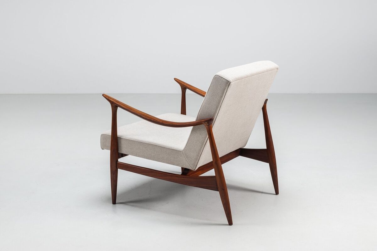 Sculptural Danish lounge chair in teak and fabric Denmark 1960