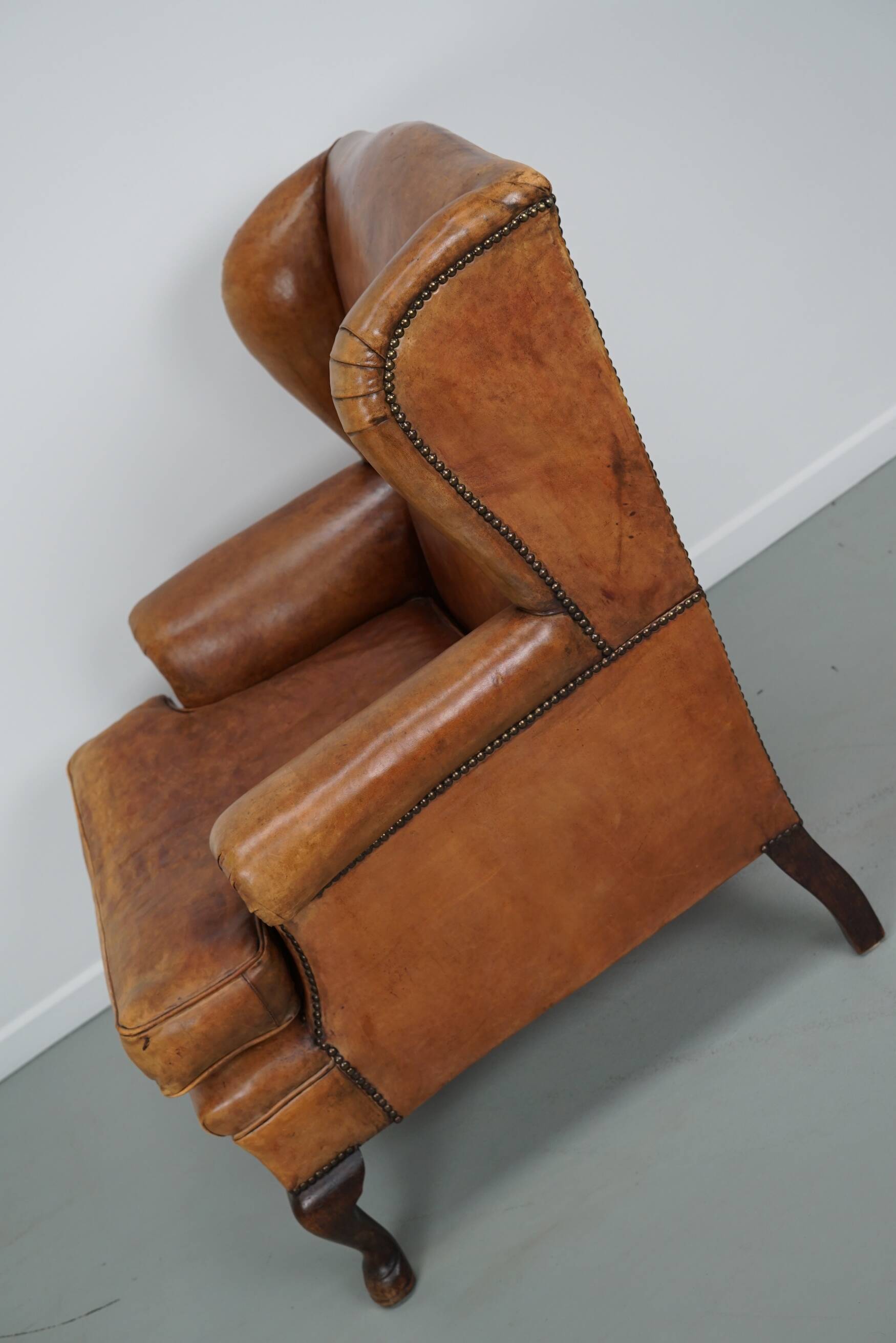 Vintage Dutch cognac coloured leather club chair, with footstool