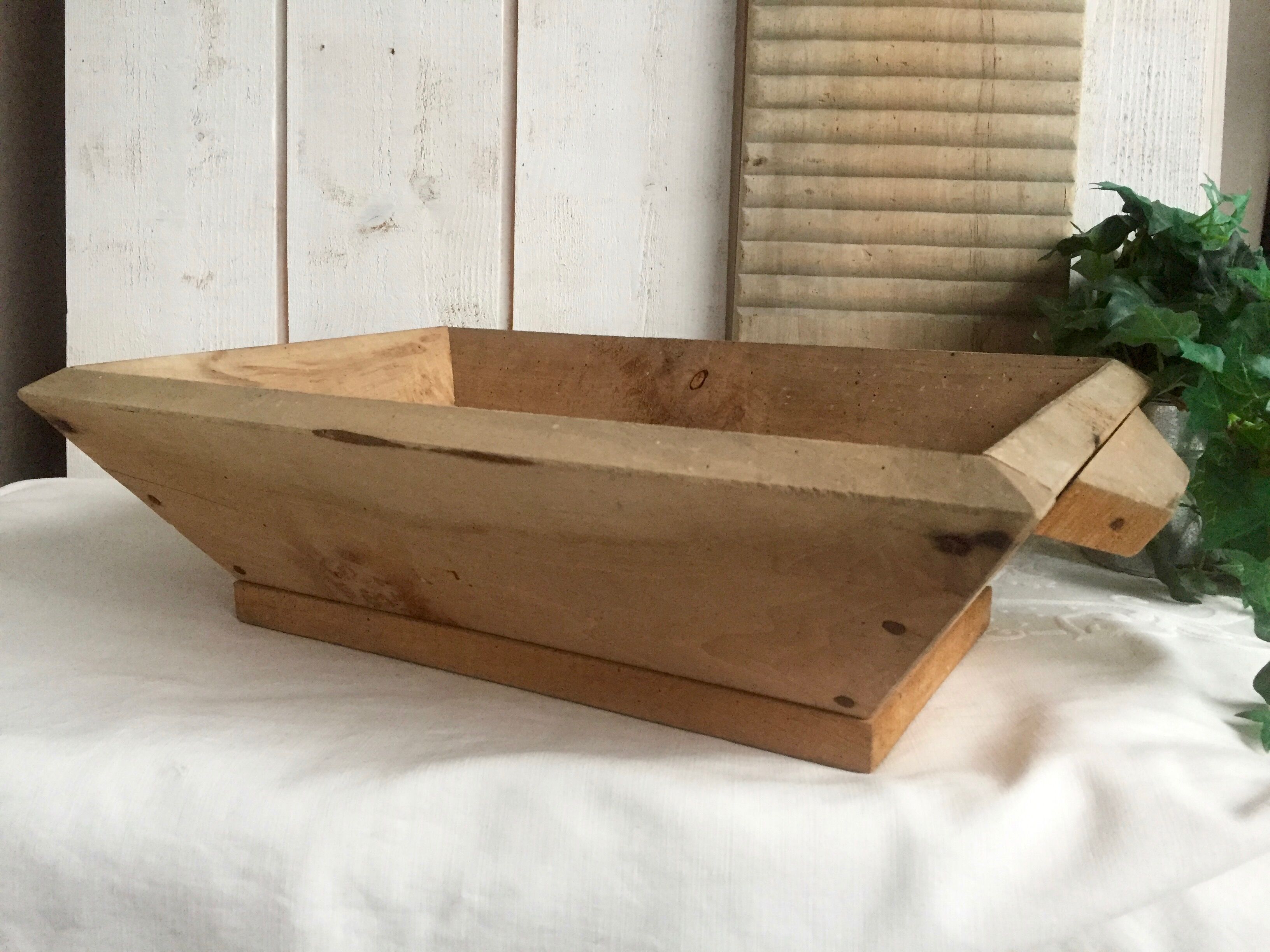 Former ferry in rough wood