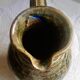 Enamelled ceramic pitcher, signature mb the terminal