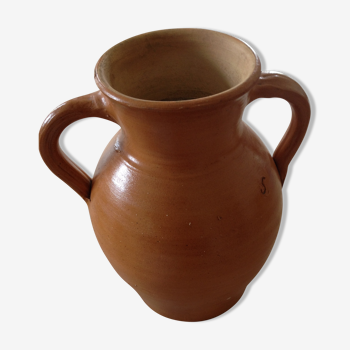 Light-colored glazed stoneware jug