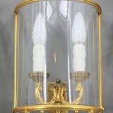 Lot de trois aplliques demi-lune en bronze doré & verre bombé