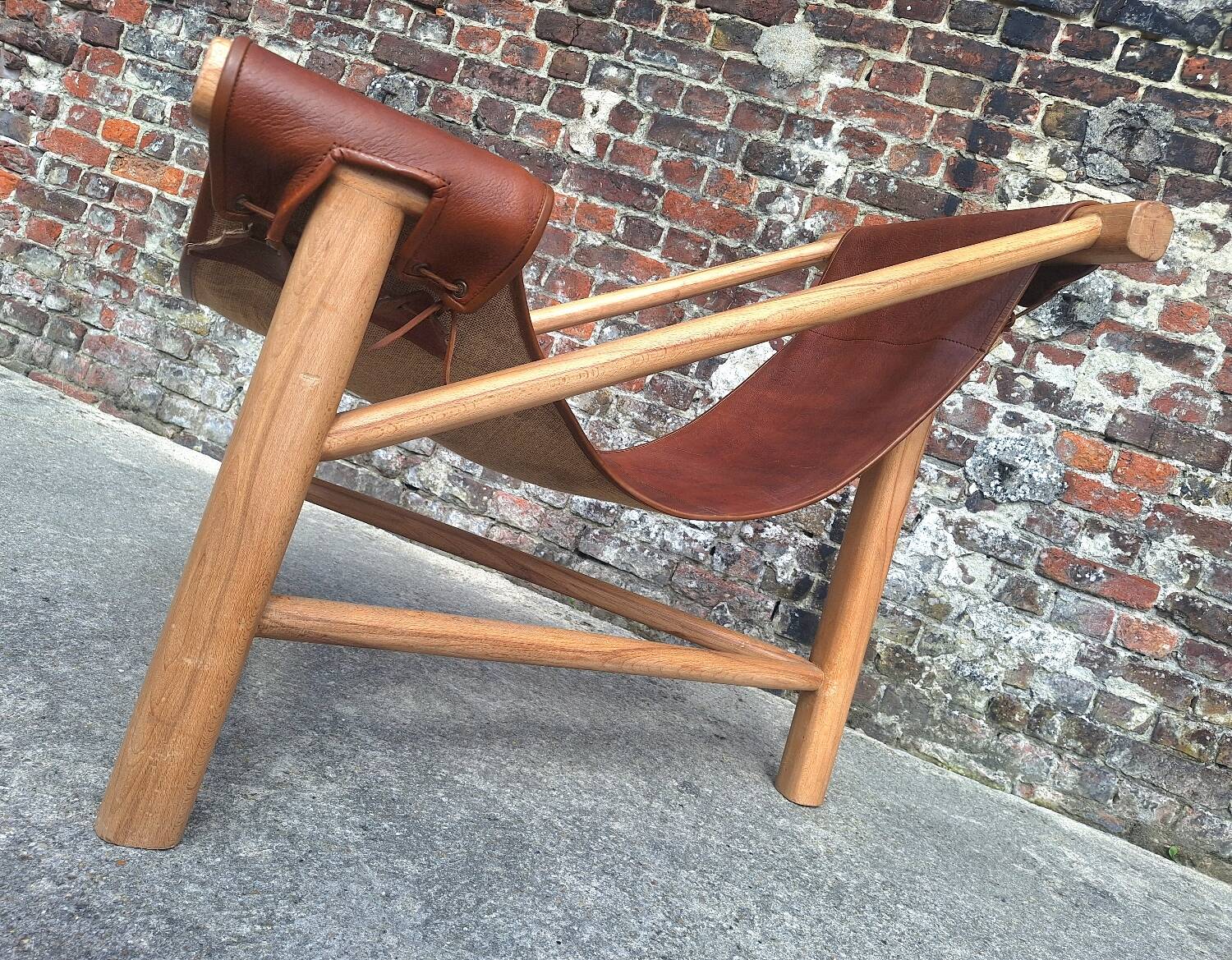 Vintage tripod armchair, designer seating furniture