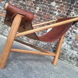 Vintage tripod armchair, designer seating furniture