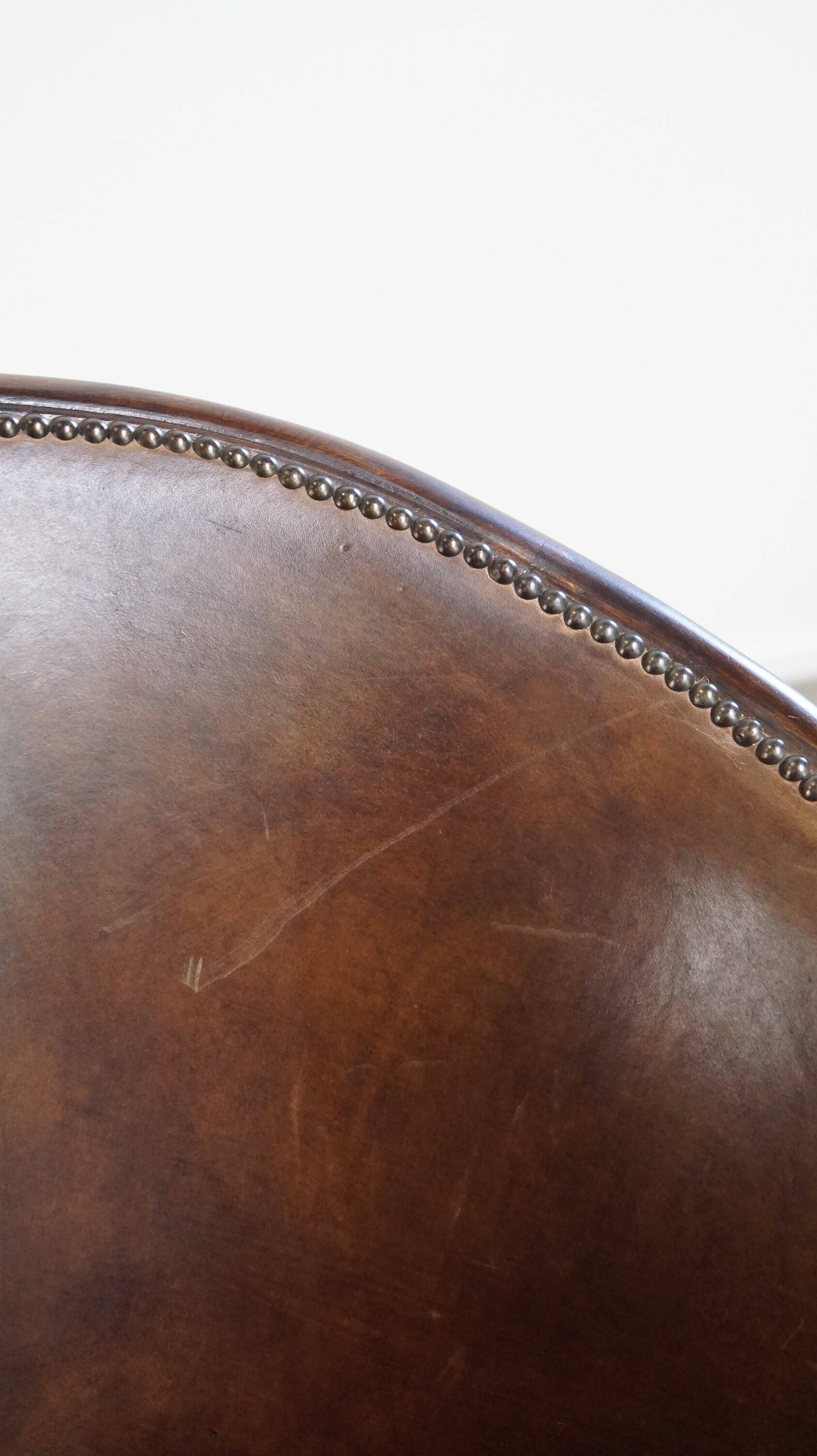 Set of 2 club chairs/armchairs in dark cognac leather
