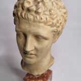 Bust of Hermes in patinated plaster on brown marble base, 34 cm