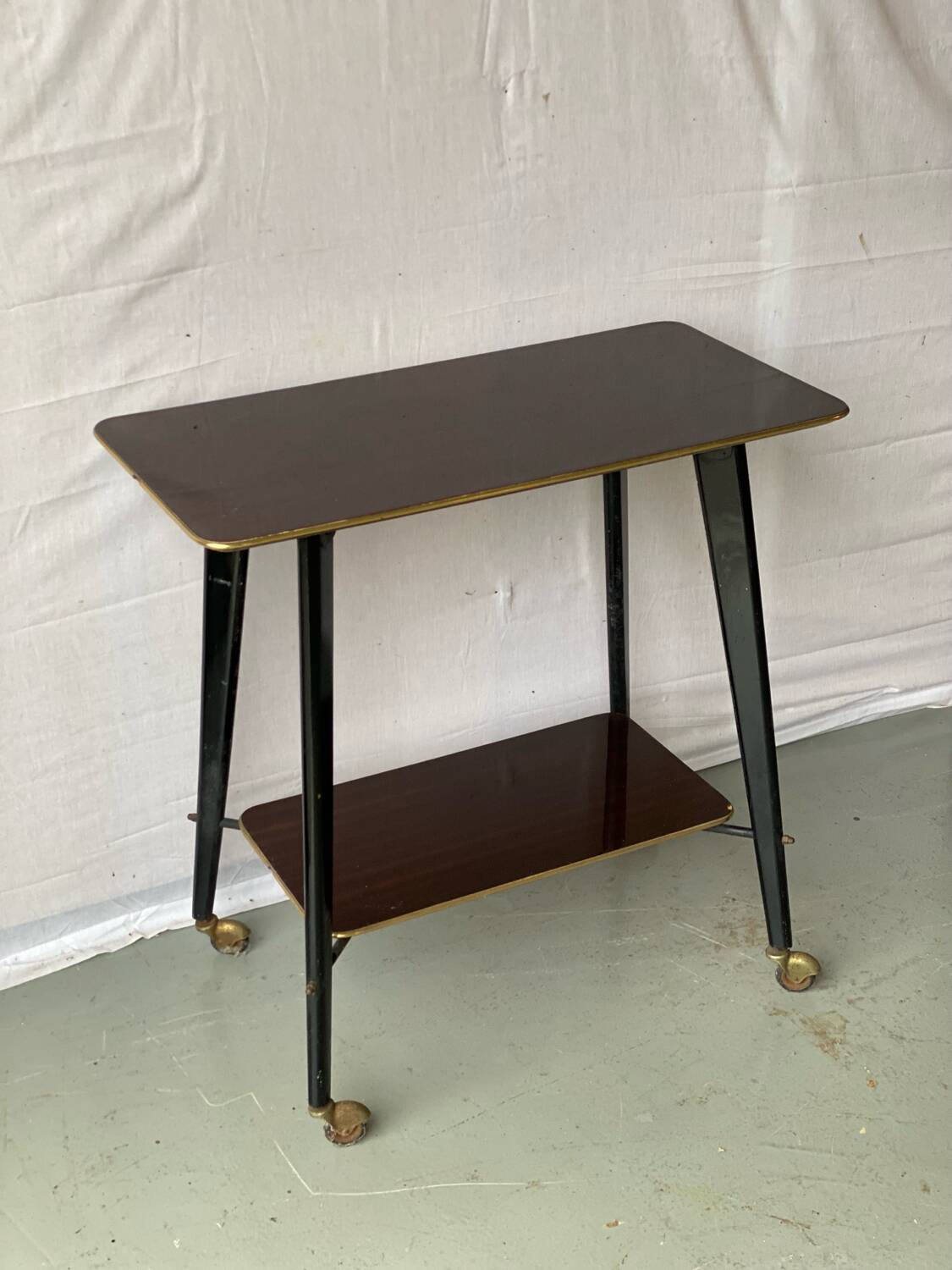 Vintage rosewood serving table on wheels from the 60s