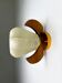 Pear-shaped "Cocoon" wall sconce, resin and pine wood, Italy, 1970s