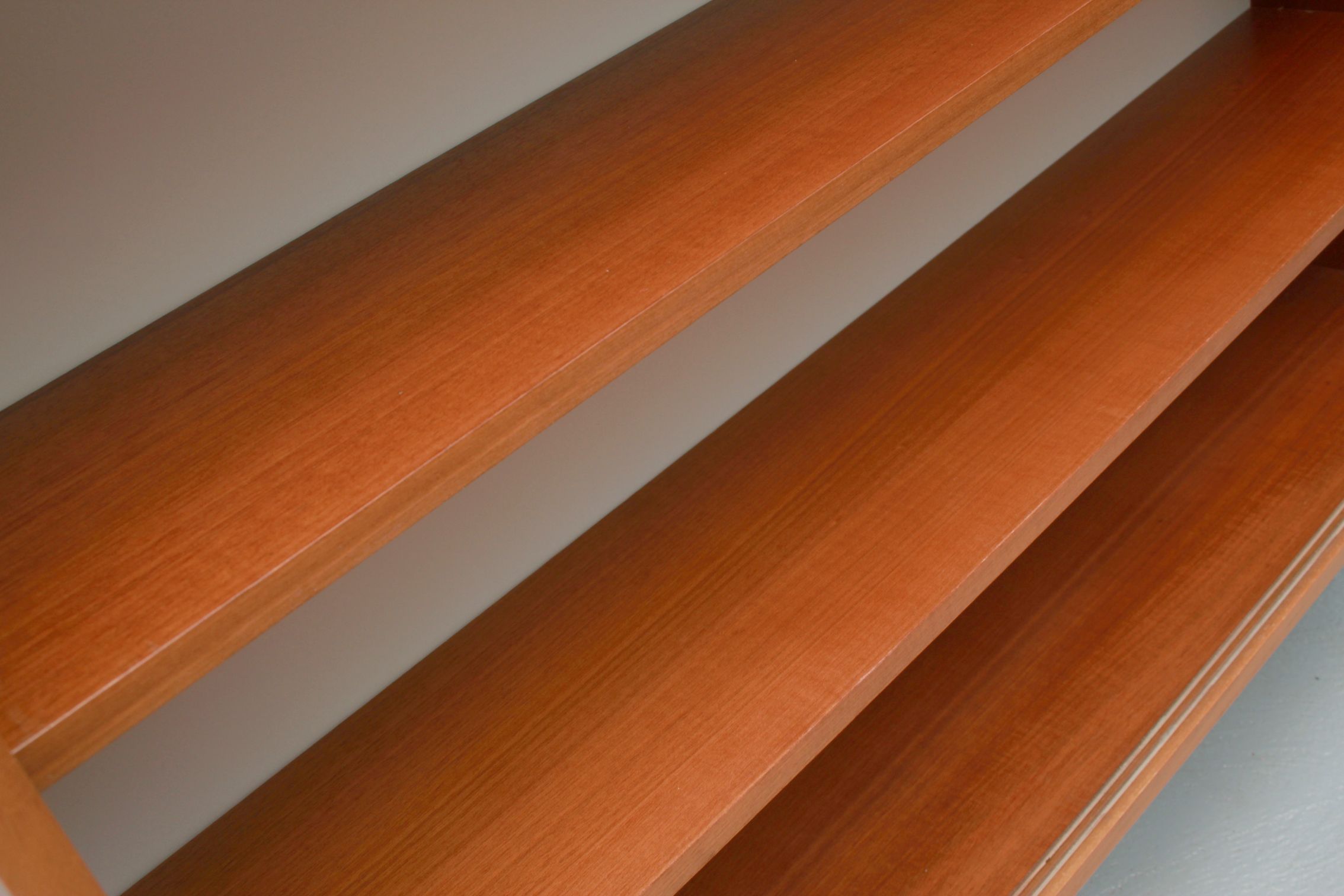 1960s book shelf in walnut, white back panel