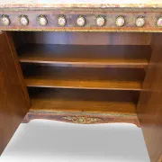 An antique French Louis XVI-style marble-top side cabinet