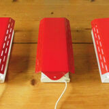 Wall lamp with red swivel shutter
