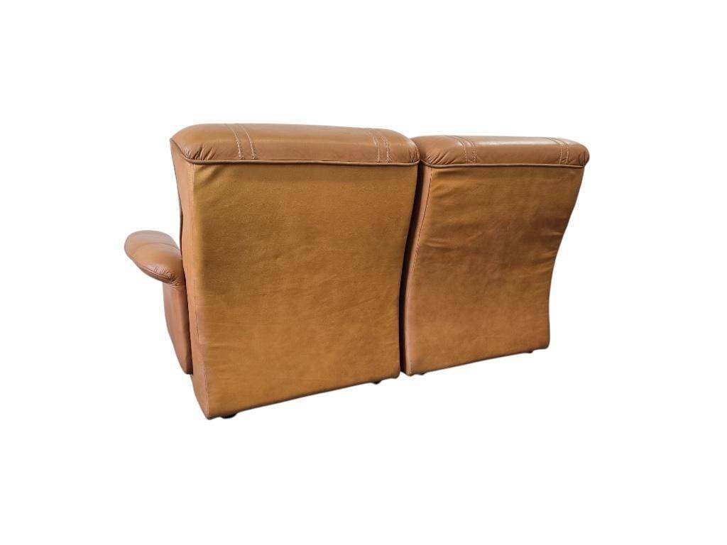 Vintage two-seater cognac leather sofa