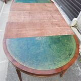 Round table with Louis XVI style extensions