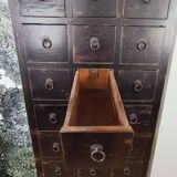 Multi-drawer cabinet with antique patina