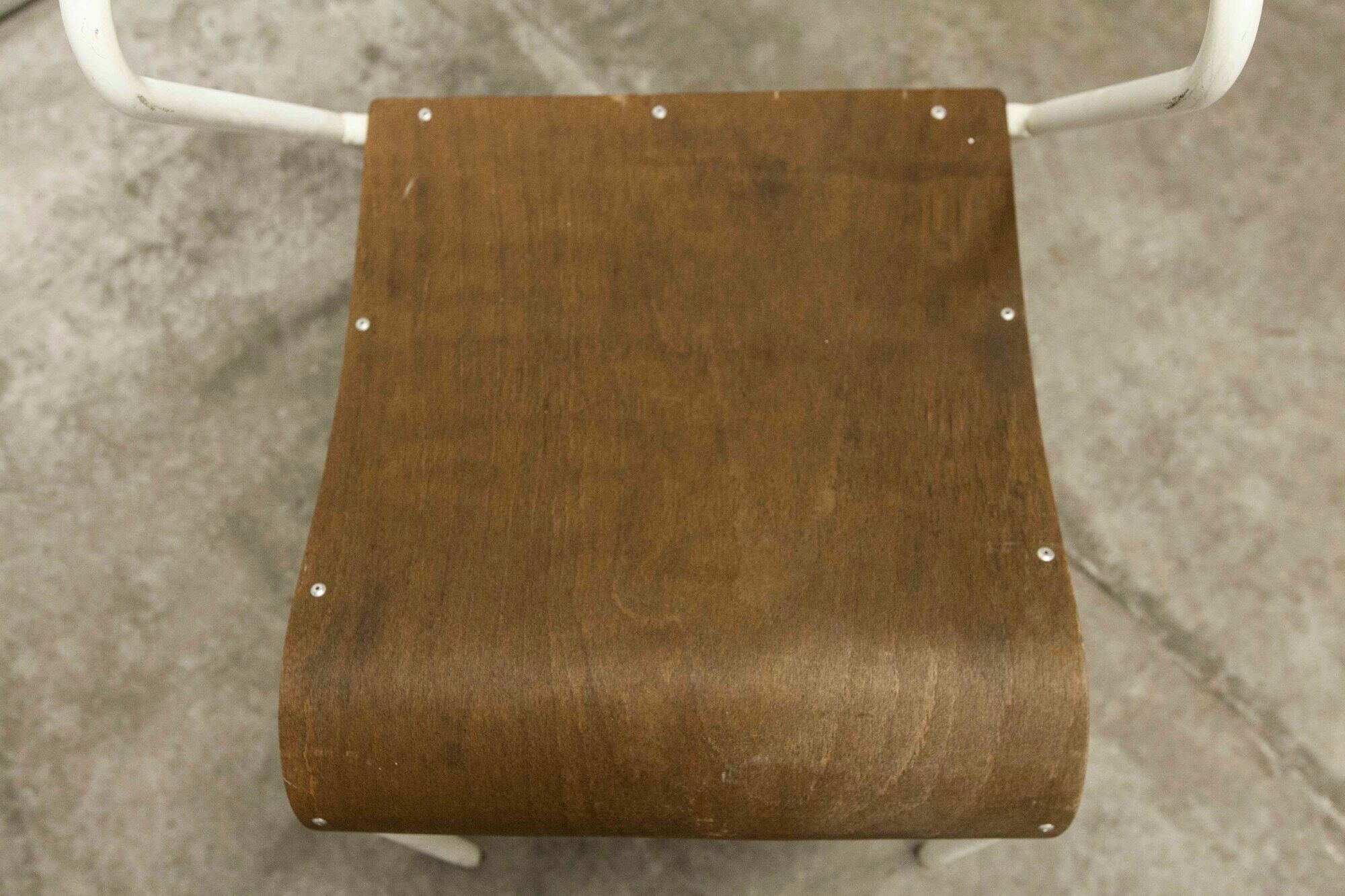 Atypical chair of the 70s metal and wood
