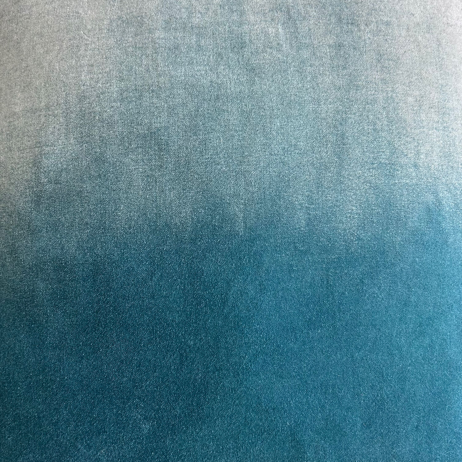 Pair of turquoise velvet cushions