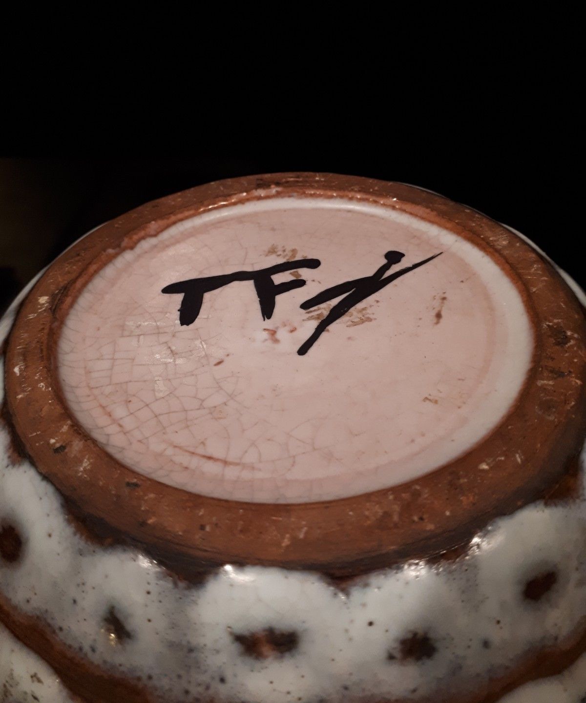 Long-necked vase from the 20s and 40s enamelled sandstone artist Tf's signature