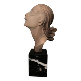 Profile of a woman 1930 in terracotta on black marble base XXth