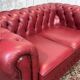 Chesterfield 2-seater leather sofa, modern production from the 2000s.