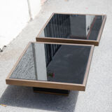 Pair of coffee tables brass black glass