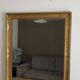 Golden mirror from the late 19th century with decoration. 100x80.