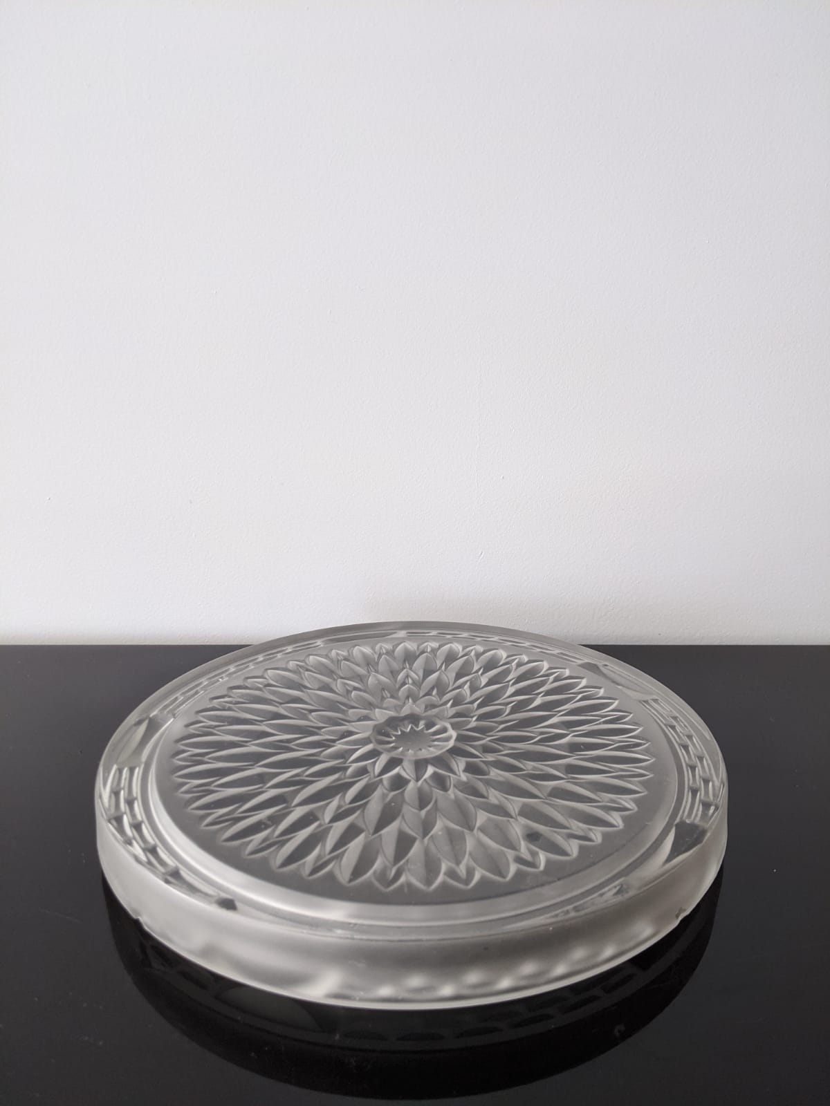 Under the plate and engraved glass bottle bottoms