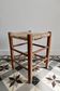 Vintage low wooden stool – Woven straw seat